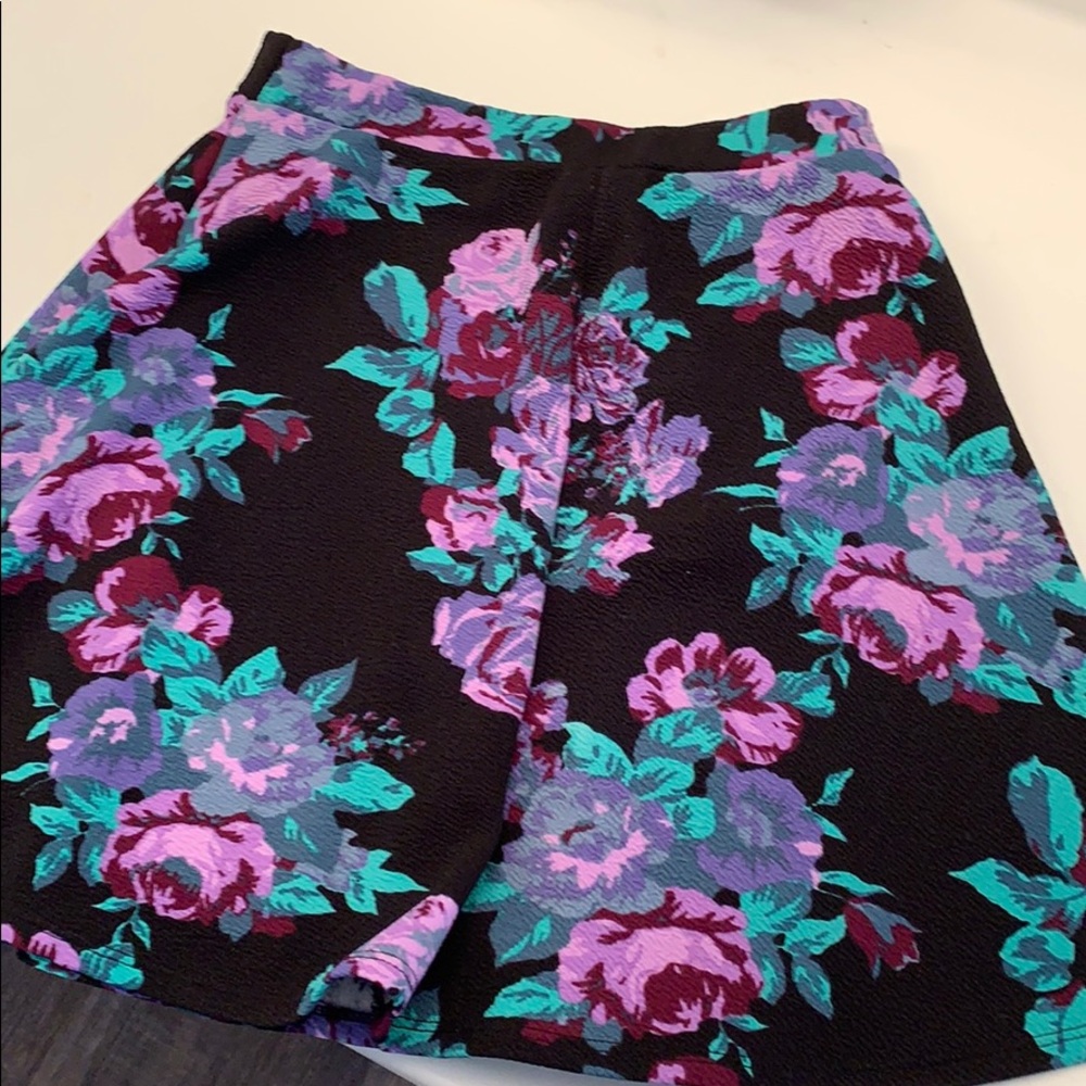 Black skirt with bright floral print